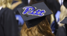 Mortarboard decorated with Pitt script