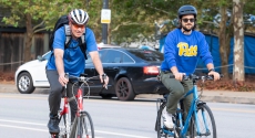 Chancellor Gallagher and Nick Goodfellow on bikes