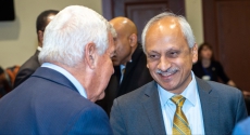 Anantha Shekhar talks to people at Board of Trustees meeting