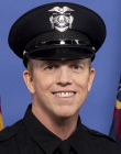 Eddie Carmack in police uniform