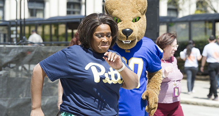 Kathy Humphrey and Roc the panther