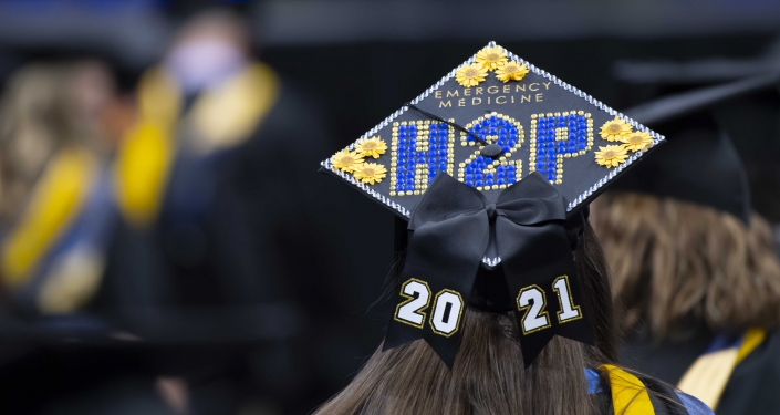 H2P hat on woman at commencement