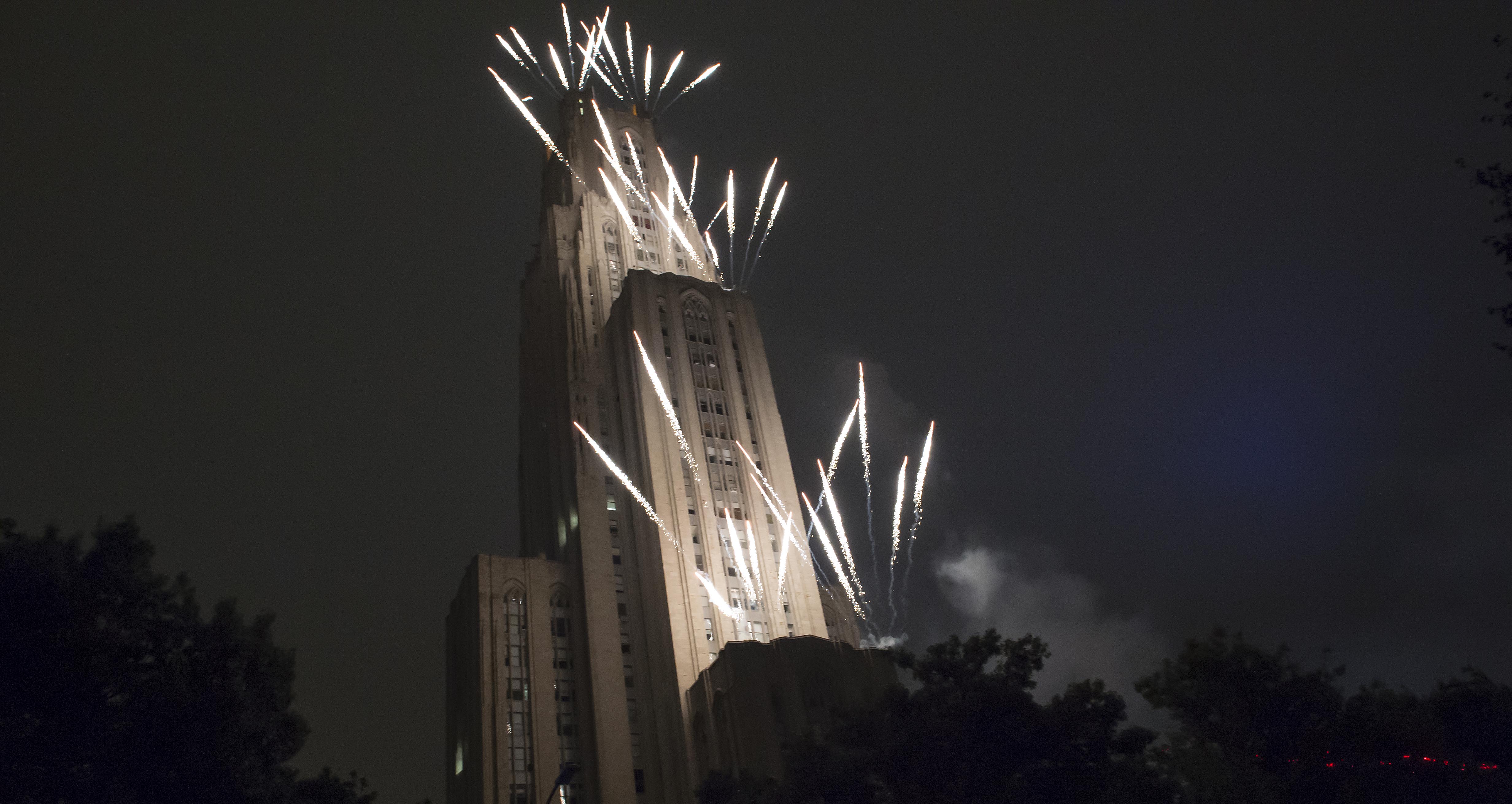 Fireworks and a laser show will cap off Homecoming activities on Oct. 25. (Aimee Obidzinski/University of Pittsburgh) Fireworks over the Cathedral