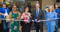 Ribbon cutting outside All of Us Pennsylvania office