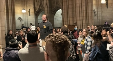 Duncan Riley addresses crowd at Cathedral