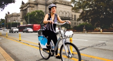 Woman on bike near Carnegie Library