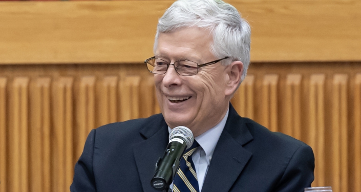 Mark Nordenberg smiling at microphone